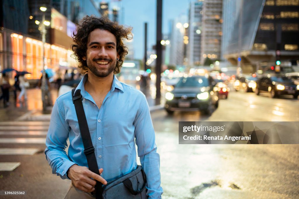 Portrait of young man at Avenida Paulista, São Paulo, Brazil