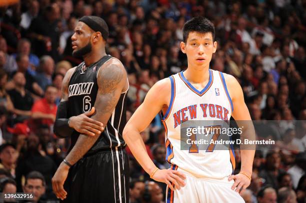 LeBron James of the Miami Heat and Jeremy Lin of the New York Knicks look on during the game on February 23, 2012 at American Airlines Arena in...