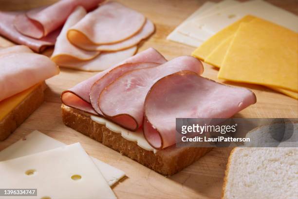 preparing a monte cristo sandwich - cold cuts stock pictures, royalty-free photos & images