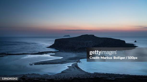 scenic view of sea against sky during sunset,kissamos province,greece - felsenküste stock pictures, royalty-free photos & images