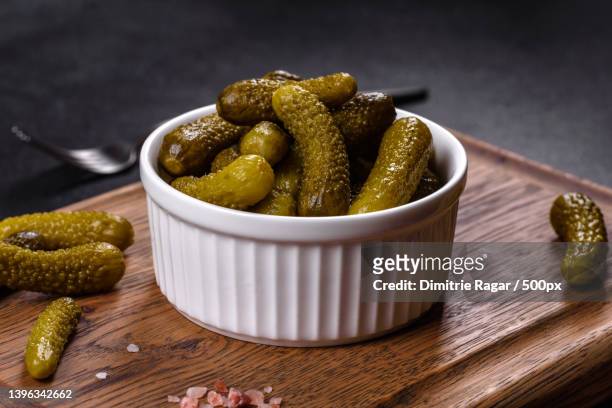 close-up of food in bowl on table - pickle jar imagens e fotografias de stock