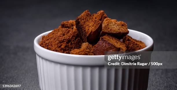 breadcrumbs cut into cubes are perfect for soup,salad - breadcrumb stock pictures, royalty-free photos & images