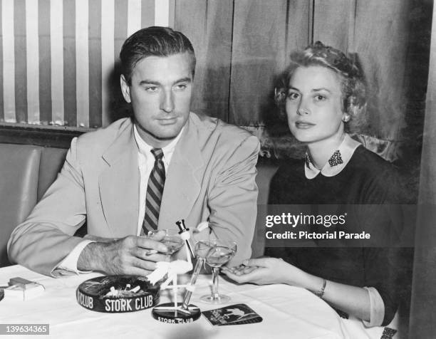 American actress Grace Kelly with her brother John B Kelly, Jr at the Stork Club, New York, 1952.