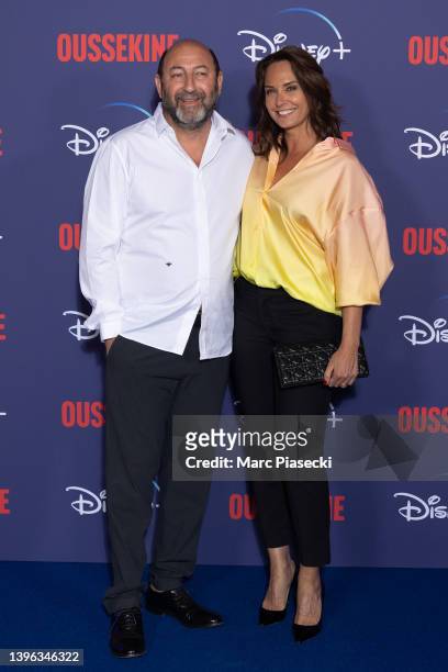 Kad Merad and Julia Vignali attend the "Oussekine" photocall at Le Grand Rex on May 09, 2022 in Paris, France.