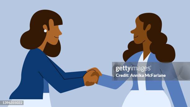 two multiracial businesswomen shake hands connecting and networking while smiling - handshake blue background stock illustrations