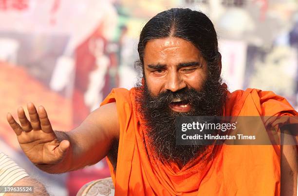 Yoga guru Baba Ramdev speaks during a press conference after Supreme Court Verdict on the Ramlila Maidan lathicharge case at Ram Jethmalani's...