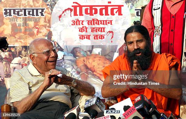 Yoga guru Baba Ramdev and Senior Advocate Ram Jethmalani address a press conference after Supreme Court Verdict on the Ramlila Maidan lathicharge...