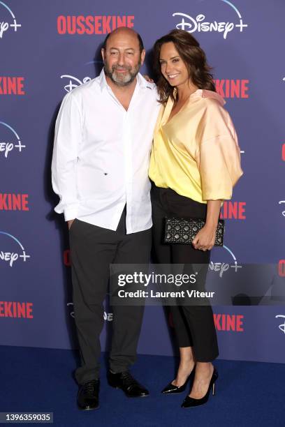 Kad Merad and Julia Vignali attend the "Oussekine" photocall at Le Grand Rex on May 09, 2022 in Paris, France.