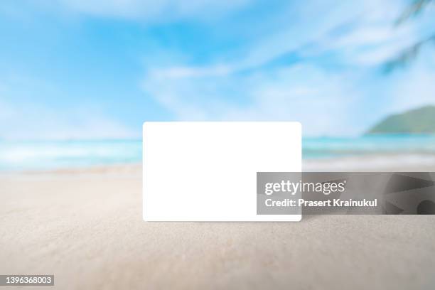 blank white card  or credit card on beautiful beach and sky - credit card mockup stock pictures, royalty-free photos & images