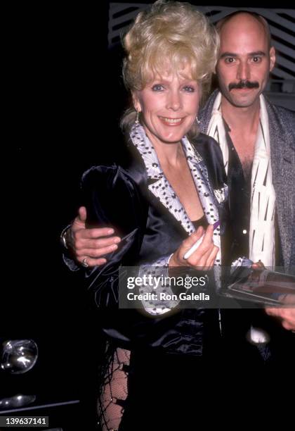 Musician Bob Kulick and actress Stella Stevens on October 2, 1985 dine at Spago in West Hollywood, California.