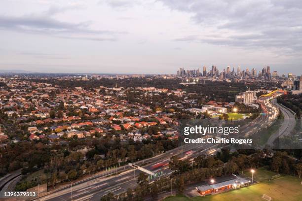aerial of suburban melbourne and cbd - melbourne parkland stock pictures, royalty-free photos & images