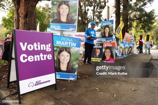 Campaign signs are seen outside the entrance to a voting centre at the Homebush West Community centre on May 10, 2022 in Sydney, Australia....