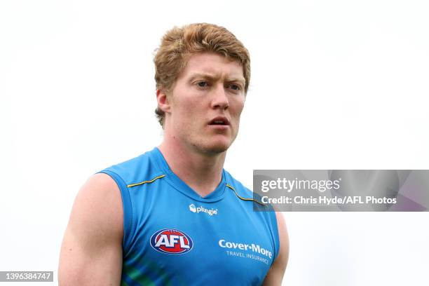 Matt Rowell looks on during a Gold Coast Suns AFL training session at Metricon Stadium on May 10, 2022 in Gold Coast, Australia.