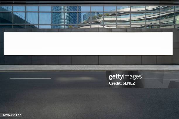 upscale shops on pedestrian street - building billboard stock pictures, royalty-free photos & images