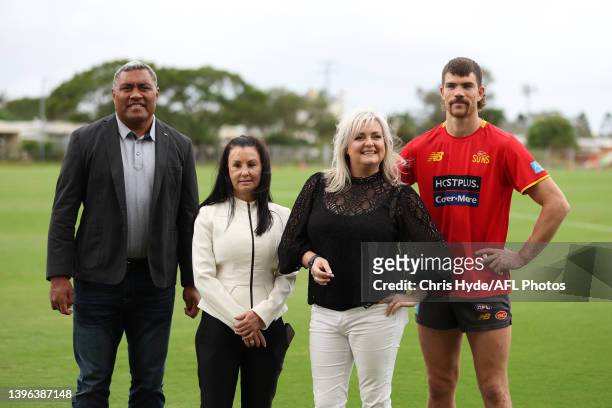 Suns key defender Sam Collins officially launches the Round to RizeUp alongside RizeUp Australia CEO Nicolle Edwards and ambassadors Petero...