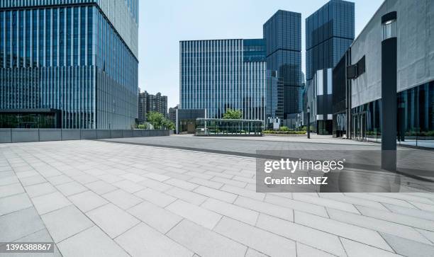 empty square by modern architectures - glass building road stock pictures, royalty-free photos & images