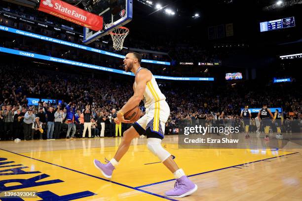 Stephen Curry of the Golden State Warriors celebrates in the final minute of their victory over the Memphis Grizzlies in Game Four of the Western...