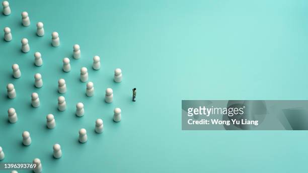 business leader and leadership concept with toy businessman and followers - capo leader foto e immagini stock