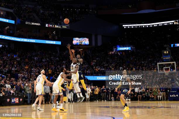 Draymond Green of the Golden State Warriors blocks a shot taken by Jaren Jackson Jr. #13 of the Memphis Grizzlies with 13 seconds left in Game Four...