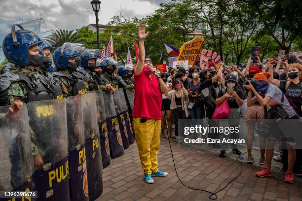 Filipinos take part in a protest against election results outside the Commission on Elections building on May 10, 2022 in Manila, Philippines....