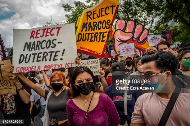Filipinos take part in a protest against election results outside the Commission on Elections building on May 10, 2022 in Manila, Philippines....