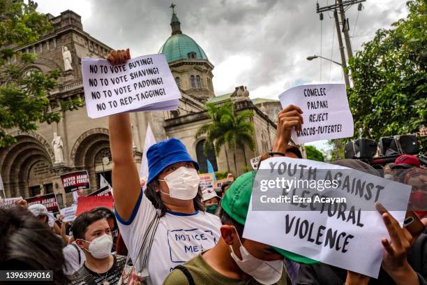 Filipinos take part in a protest against election results outside the Commission on Elections building on May 10, 2022 in Manila, Philippines....