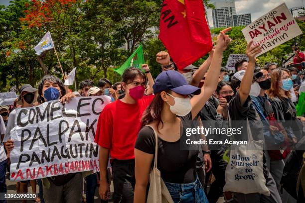 Filipinos take part in a protest against election results outside the Commission on Elections building on May 10, 2022 in Manila, Philippines....