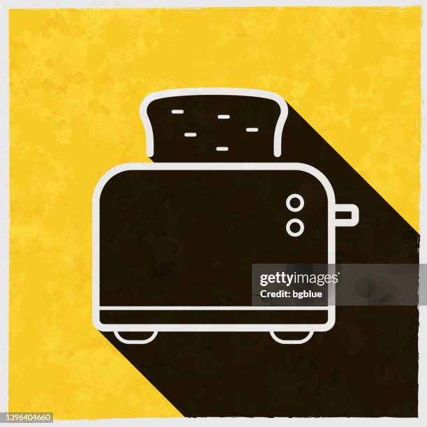 toaster. icon with long shadow on textured yellow background - toast bread stock illustrations