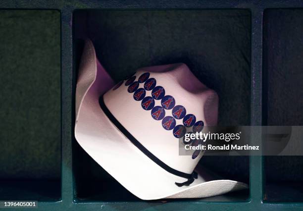 Cowboy hat in the Los Angeles Angels dugout at Angel Stadium of Anaheim on May 09, 2022 in Anaheim, California.