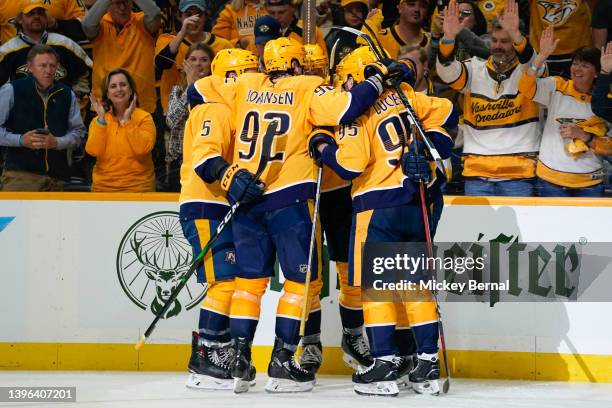 The Nashville Predators celebrate a goal against the Colorado Avalanche in the third period of Game Four of the First Round of the 2022 Stanley Cup...