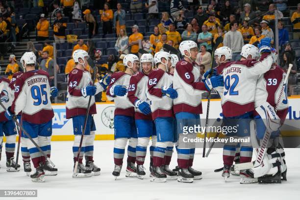Pavel Francouz of the Colorado Avalanche celebrates with his teammates after defeating the Nashville Predators in Game Four of the First Round of the...