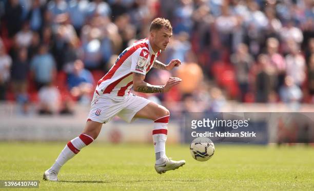 Josh Tymon of Stoke City runs with the ball during the Sky Bet Championship match between Stoke City and Coventry City at Bet365 Stadium on May 07,...