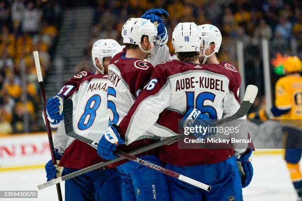 The Colorado Avalanche celebrate after defeating the Nashville Predators 5-3 during Game Four of the First Round of the 2022 Stanley Cup Playoffs at...