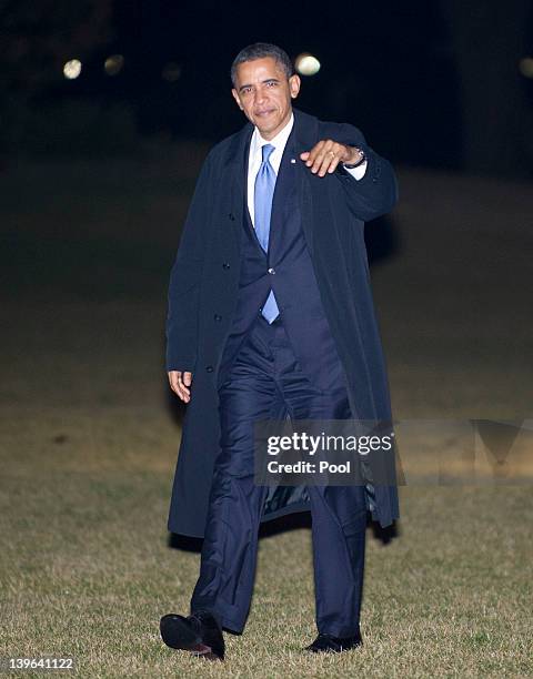 President Barack Obama returns to the White House following a day trip to Miami and Orlando, FL., in the early morning hours on February 24, 2012 in...