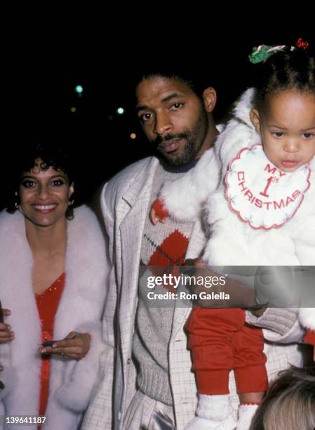 Actress Debbie Allen, husband Norman Nixon and daughter Vivian Nixon attending "Hollywood Christmas Parade" on December 1, 1985 in Hollywood,...