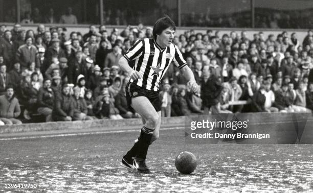 Newcastle striker Peter Beardsley in action on the orange ball wearing trainers on an icy pitch during the FA Cup 3rd round match against Brighton &...