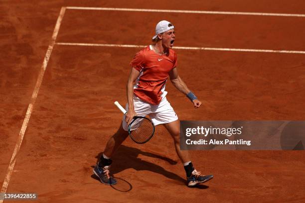 Denis Shapovalov of Canada cleberates winning the first set in his men's singles first round match against Lorenzo Sonego of Italy during day two of...