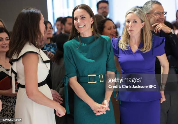 Catherine, Duchess of Cambridge with Caroline Rush, Chief Executive of the British Fashion Council and Stephanie Phair, British Fashion Council...