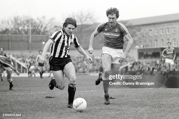 Newcastle United striker Peter Beardsley runs past Ipswich Town defender Terry Butcher during a First Division match at St James' Park on March 15th,...