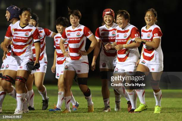 Japan celebrate winning the Women's International Test match between the Australia Wallaroos and Japan at Bond University on May 10, 2022 in Gold...