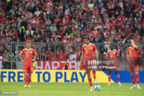 Joshua Kimmich, Thomas Mueller in action during the Bundesliga match between FC Bayern München and VfB Stuttgart at Allianz Arena on May 08, 2022 in...