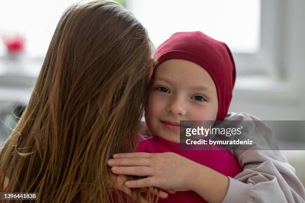 cancer patient at home - childhood cancer stock pictures, royalty-free photos & images