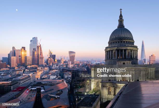multi layered cityscape of london skyline at sunset - st paul's cathedral london stock-fotos und bilder
