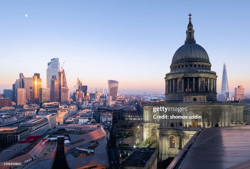 Multi layered cityscape of London skyline at sunset