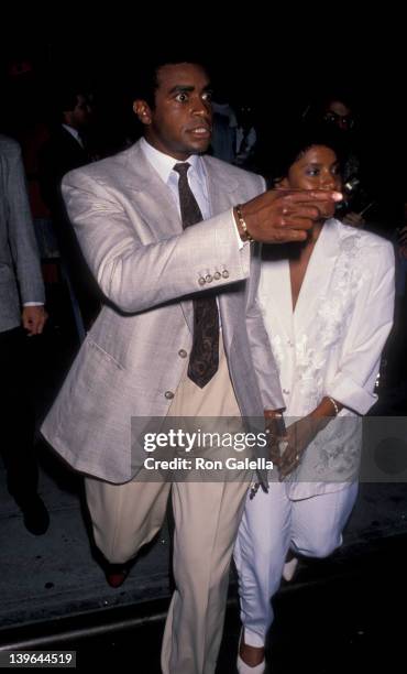 Actress Phylicia Rashad and sportscaster Ahmad Rashad attending the premiere of "Mo' Better Blues" on July 23, 1990 at the Ziegfeld Theater in New...