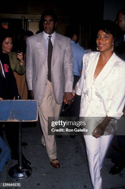 Actress Phylicia Rashad and sportscaster Ahmad Rashad attending the premiere of "Mo' Better Blues" on July 23, 1990 at the Ziegfeld Theater in New...