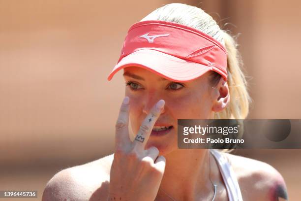 Tereza Martincova of Czech Republic reacts in her women's singles first round match against Amanda Anisimova of the United States during day three of...