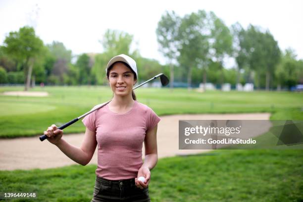 female golf player - country club woman stock pictures, royalty-free photos & images