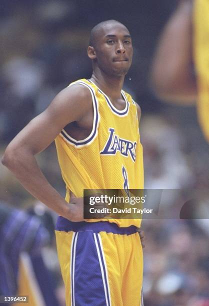 Guard Kobe Bryant of the Los Angeles Lakers stands on the court during his first career game against the Minnesota Timberwolves on November 3, 1996...