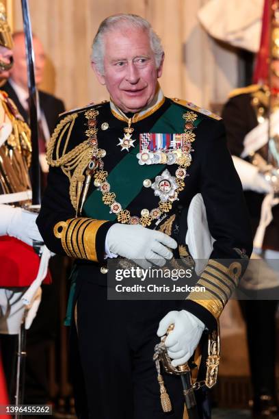 Prince Charles, Prince of Wales departs from the Sovereign's Entrance after attending the State Opening of Parliament at Houses of Parliament on May...